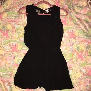 Black romper with detailing on top!